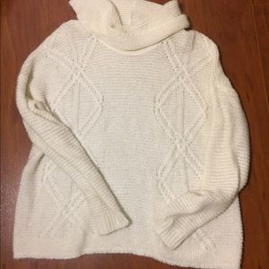 Long knitted sweater